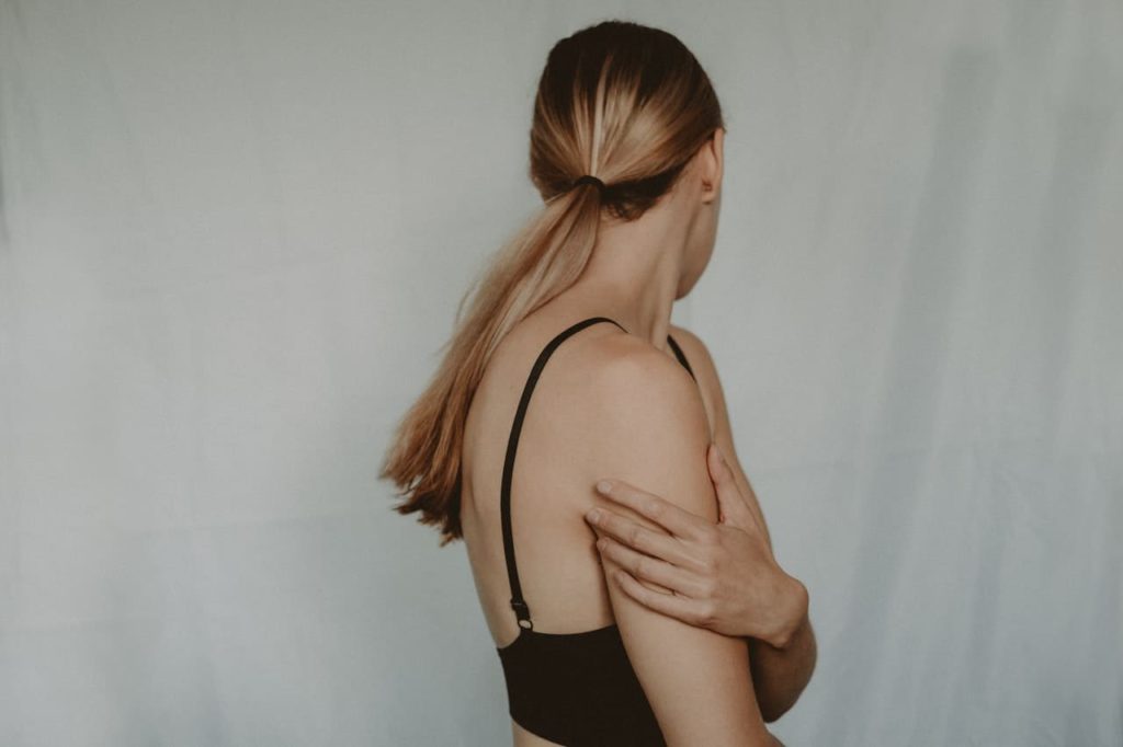 Title image: Woman with self-doubt