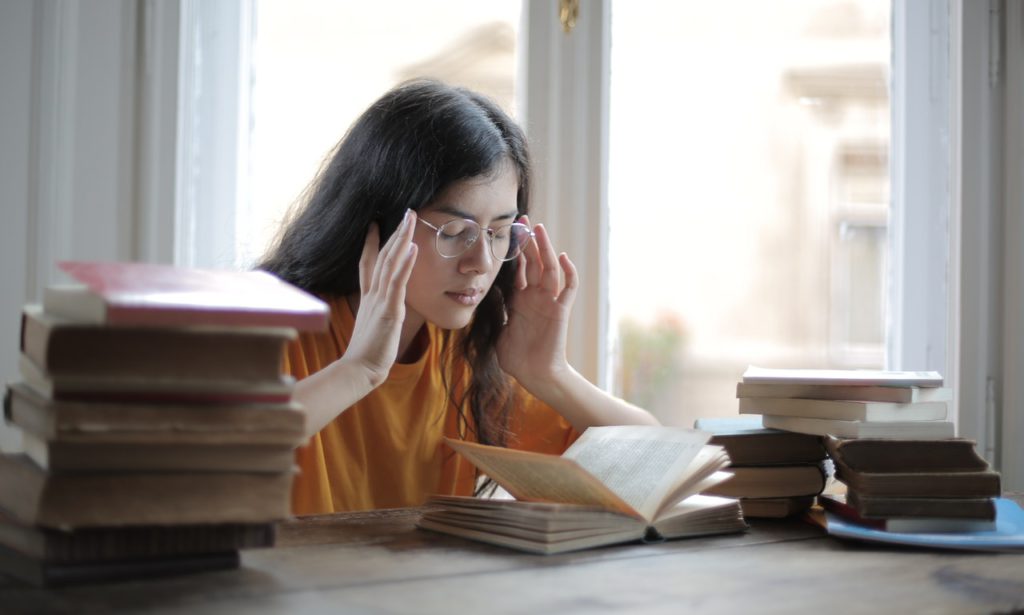 Title image: Woman experiencing chronic stress
