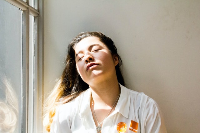 Title image: A person feeling drained at work
