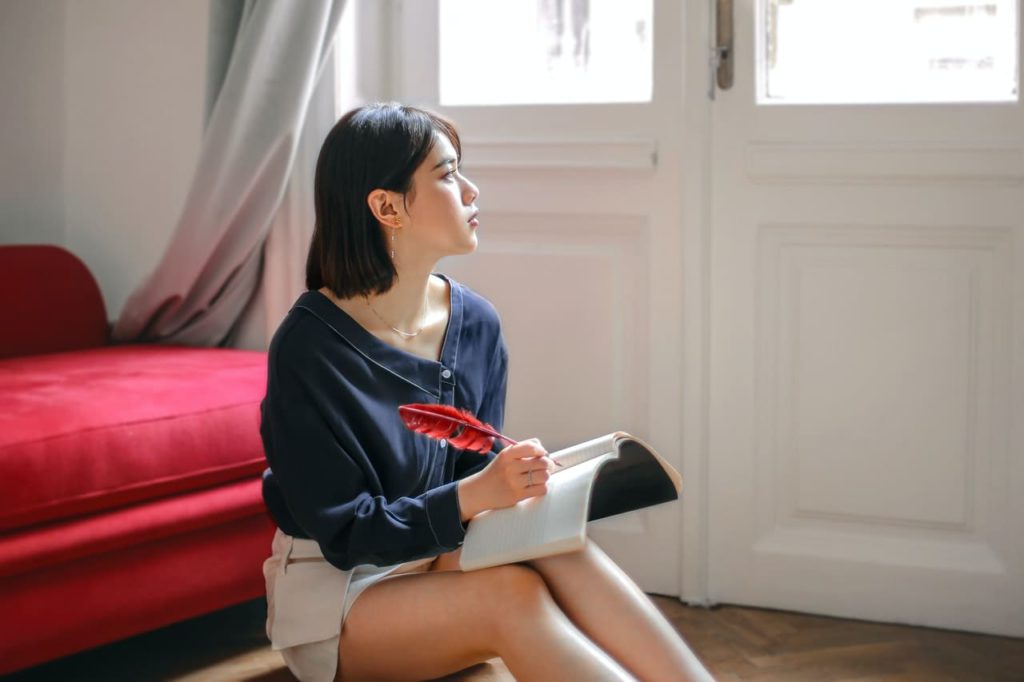 Title image: Woman brooding over fear of the future